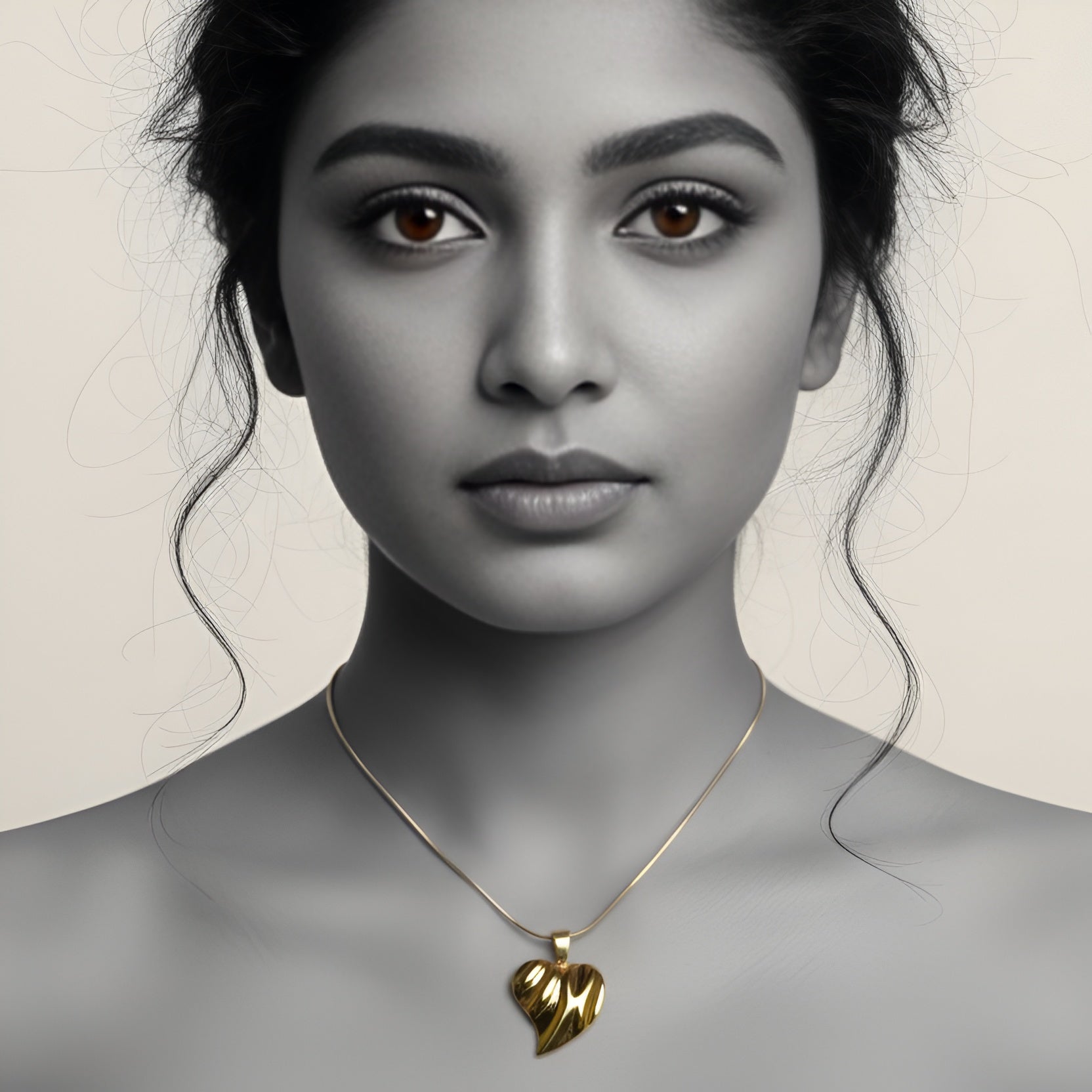 The Golden Ripple Heart Necklace