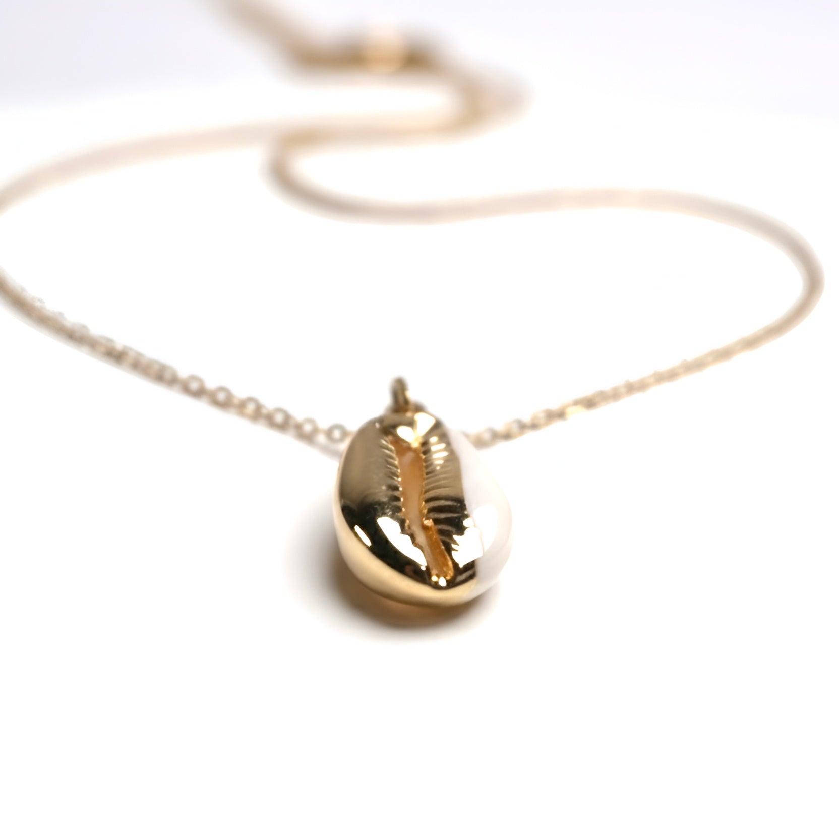 The Golden Cowrie Whisper Necklace