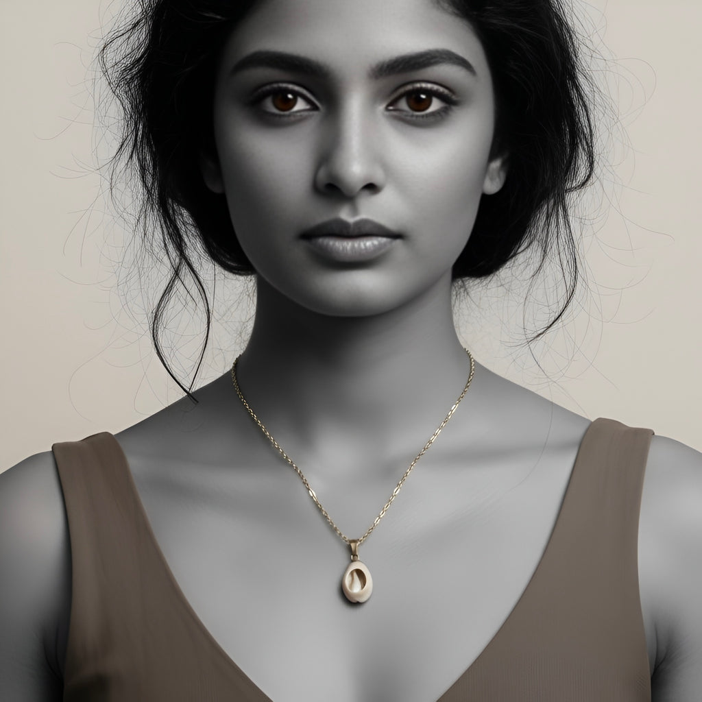 The Golden Cowrie Whisper Necklace