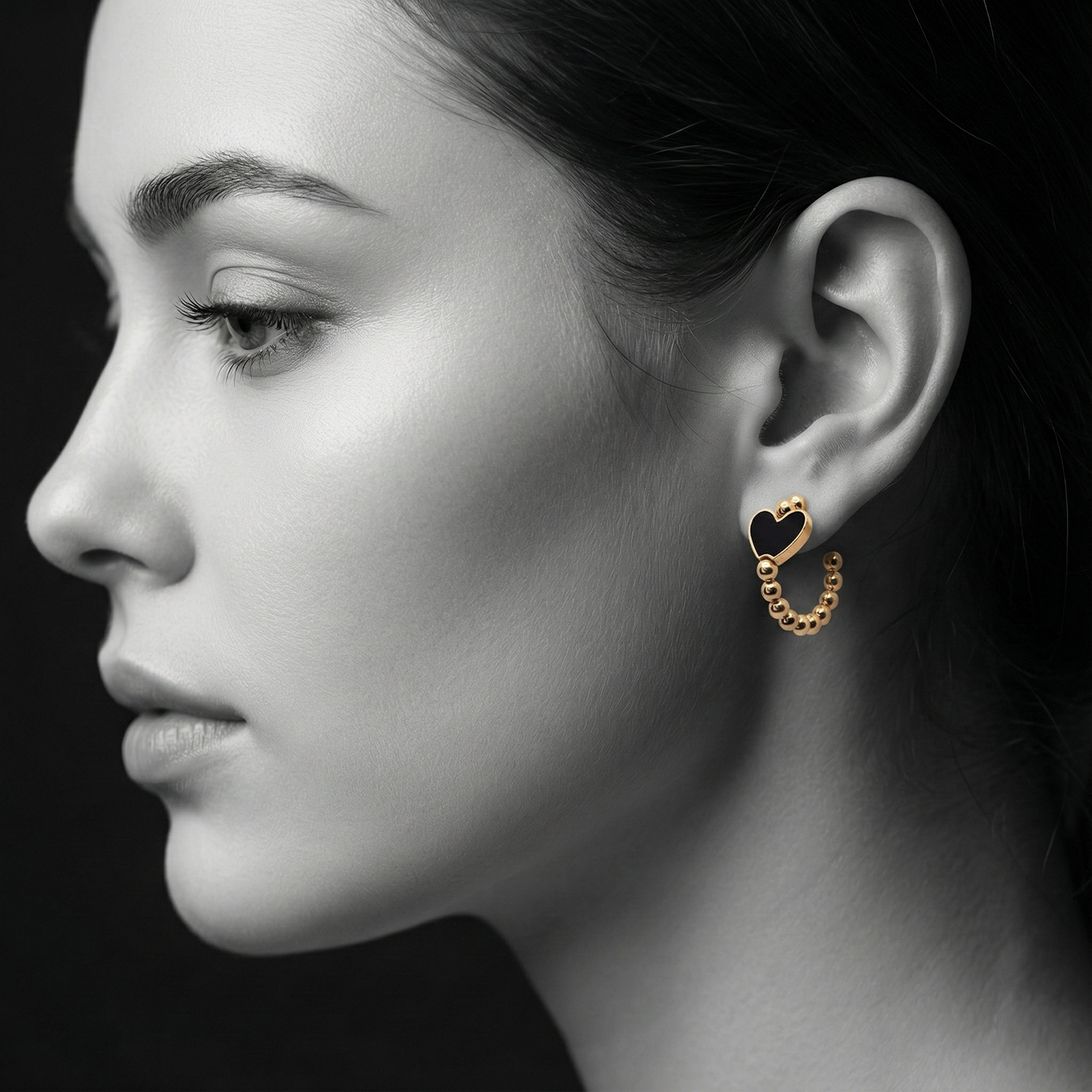 The Noir Heart Huggie Earrings